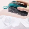 ffd258e836dd1422c8e15692db36d627.webp Random Soap Dispensing Laundry Brush